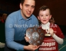 Aaron McHenry from Central Restaurant Ballycastle presenting Ruairi Og Cushendall team captain Jake Laffan with the Central Restaurant U8 Indoor Hurling Division 4 Shield
